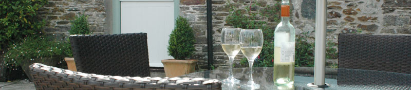 Enjoy a glass of wine in the courtyard